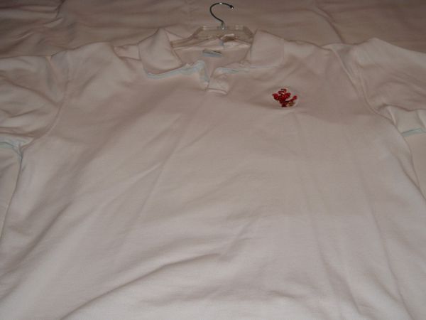 Great white polo with Tigger embroidered on front.