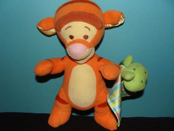 Baby Tigger Holding a Blanket & a Frog